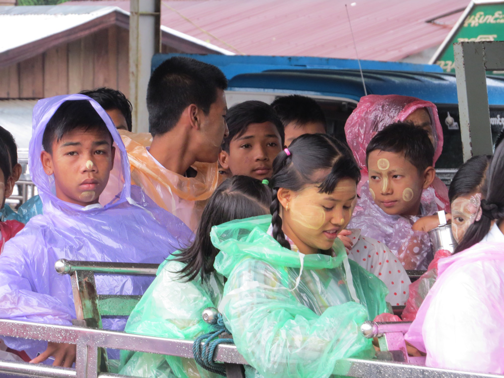 Children applying on their face with natural Thanakha powder